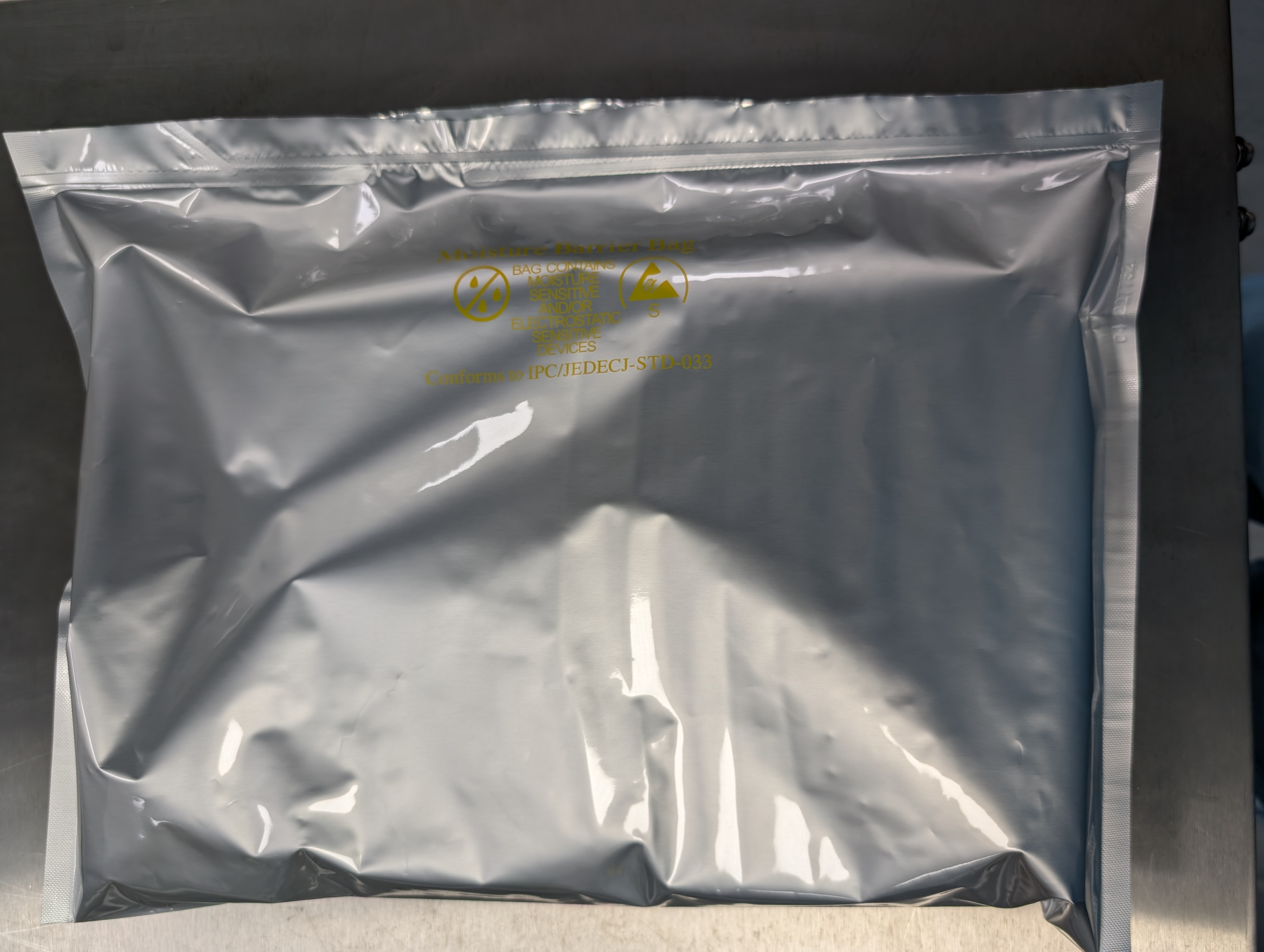 A completely sealed antit-static bag with a hybrid panel box inside.
